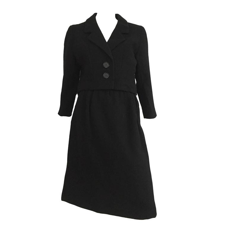 Norman Norell 1959 black wool skirt suit size 12. at 1stdibs