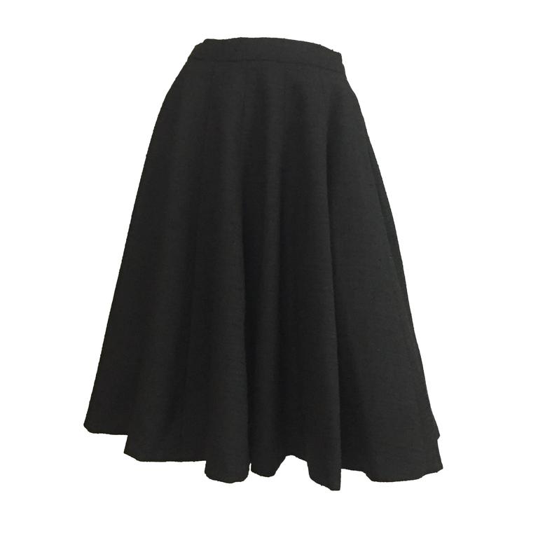 Norman Norell 1957 black wool flare skirt size 6 / 8. For Sale at 1stDibs