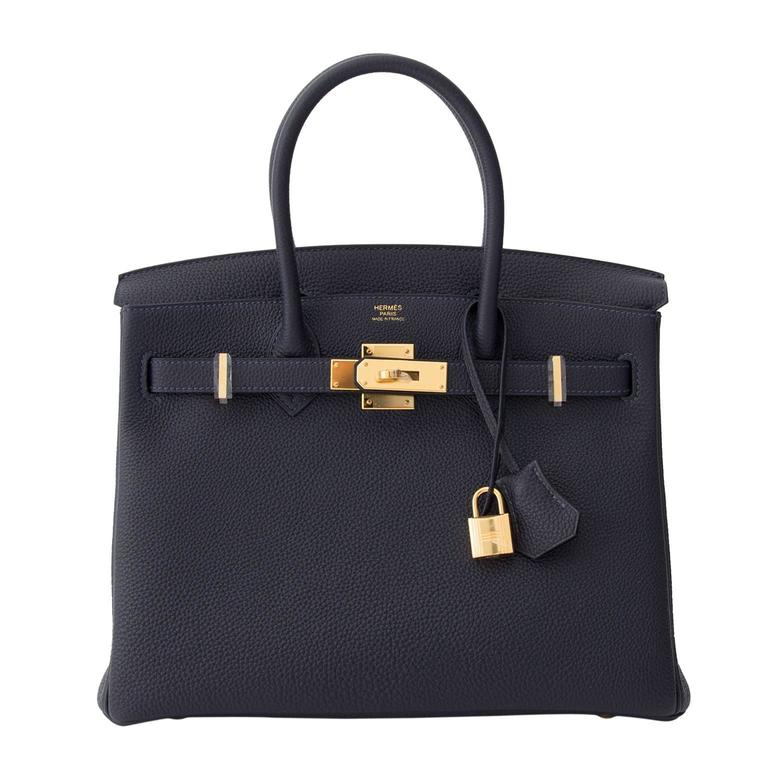 Kelly 25 Bleu Nuit in Togo Leather with Gold Hardware