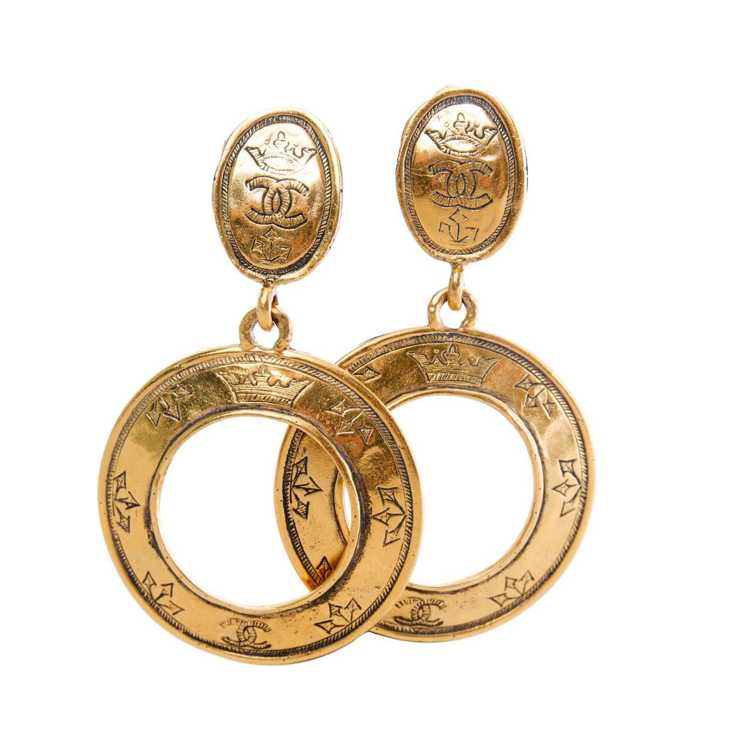 Large gold dangle hoop earrings