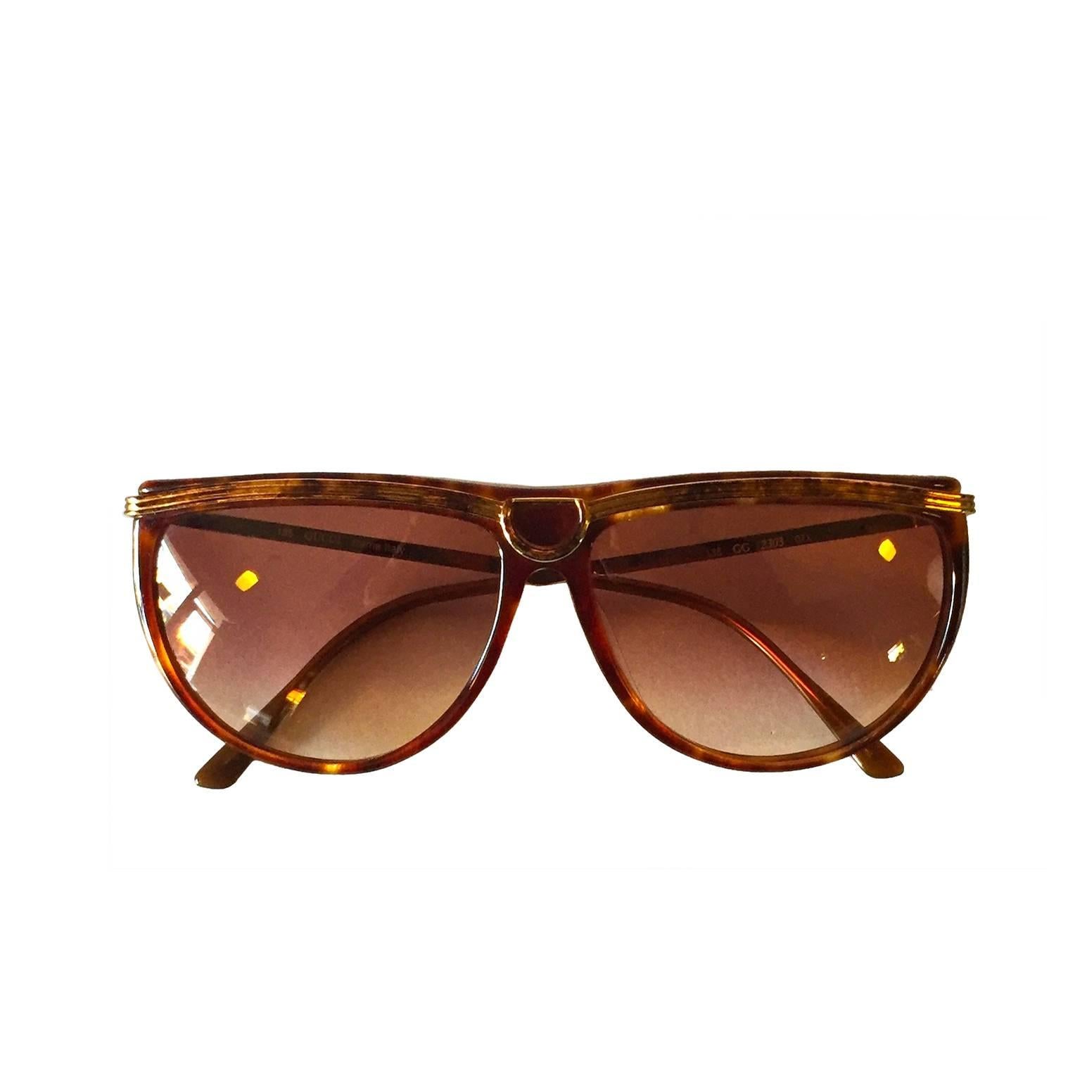 Original 1980s Vintage Gucci Sunglasses in Tortoise color with Metal Sides