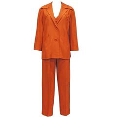 Retro Christian Dior burnt orange raw silk pant suit with cone bra, c. 1950s