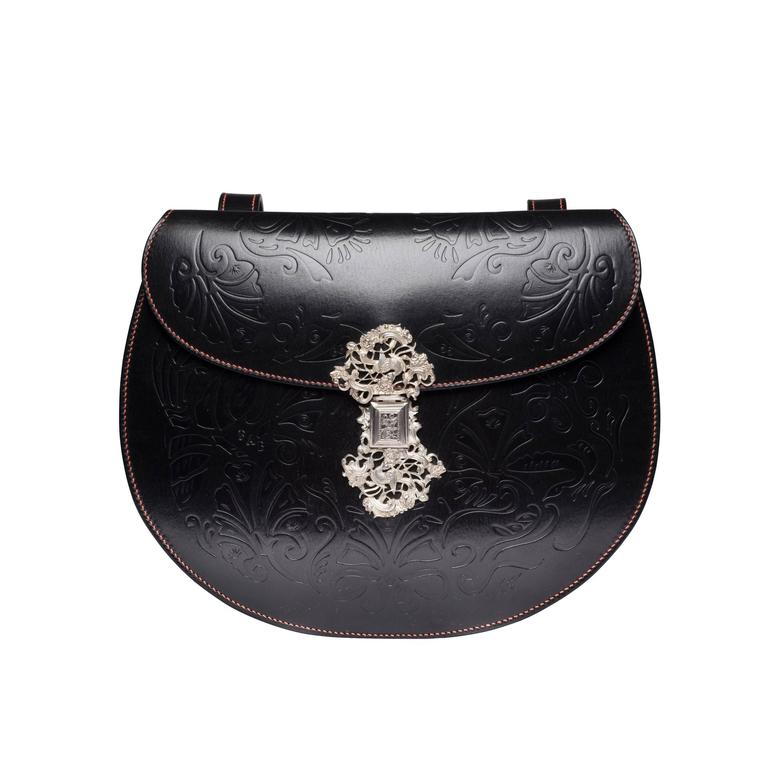 Smerrell. A doublesided, austere and decorative, handsewn shoulder