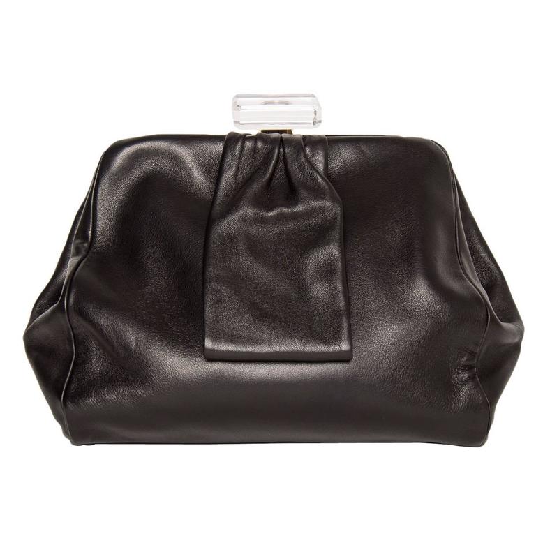 leather clutch bag with wrist strap