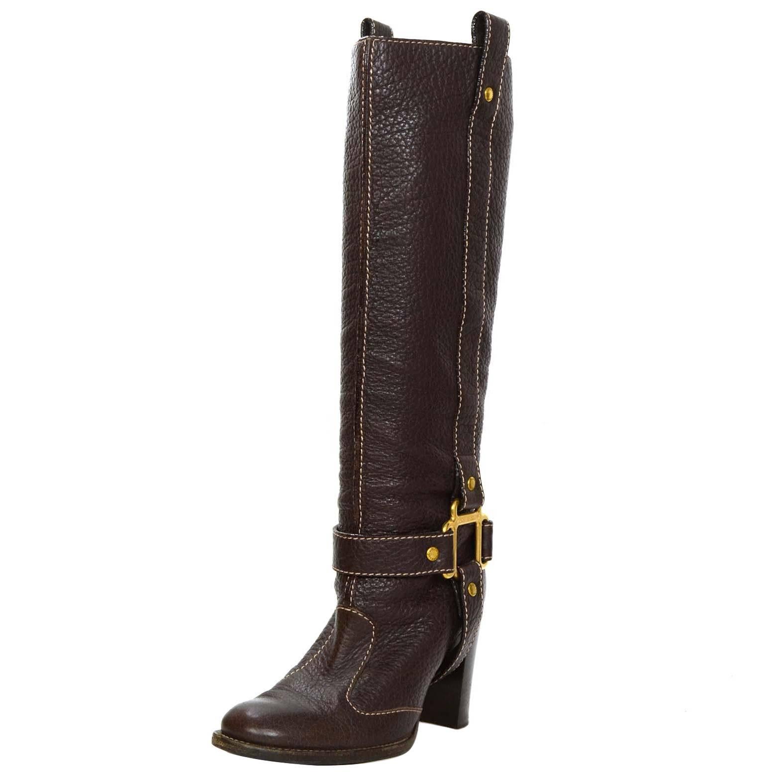 Dolce & Gabbana Brown Leather Tall Boots 
Features beige contrast stitching
Made In: Italy
Color: Brown
Materials: Leather
Closure/Opening: Pull on
Sole Stamp: Dolce & Gabbana Vero Cuoio Made in Italy 35
Overall Condition: Excellent pre-owned