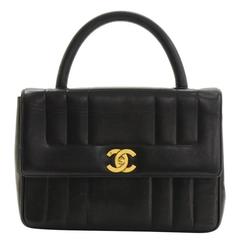 Vintage Chanel Kelly Black Vertical Quilted Leather Flap Hand Bag