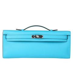 Kelly Cut  Pochette Turquoise in Swift Leather and Silver HDW 
