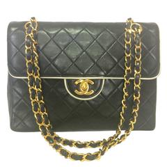 Vintage Chanel black and white lambskin 2.55 shoulder bag with golden chains 3