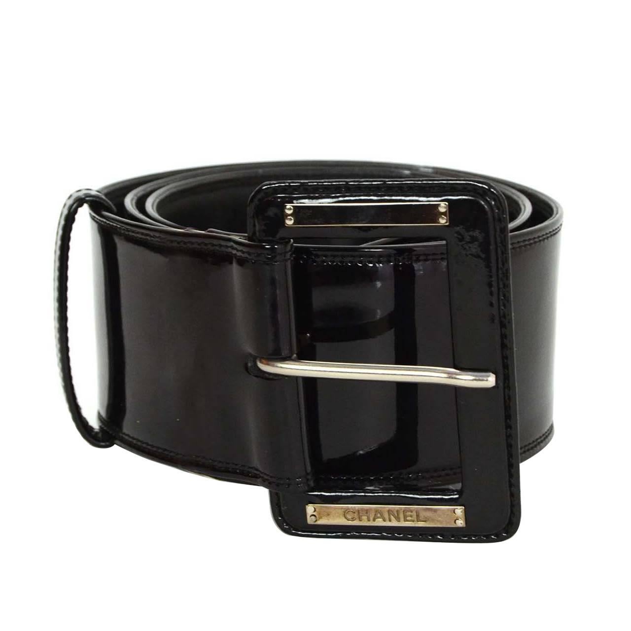 Chanel Black Patent Extra Wide Belt 
Features extra large black patent and silvertone buckle

Made In: France
Year of Production: 2007
Color: Black
Hardware: Silvertone
Materials: Patent leather and metal
Closure: Buckle and notch