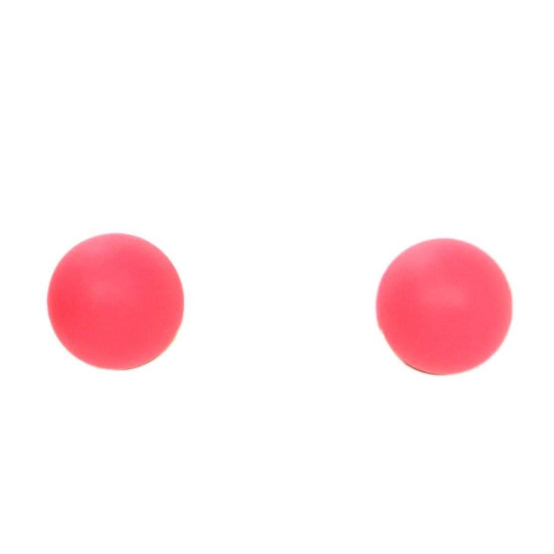 Dior Matte Coral Pink Miss en Dior Tribal Earrings
Color: Bright coral pink
Hardware: Silvertone
Materials: Metal and coated metal
Closure: Pierced back with smaller neon pink ball at end
Stamp: Dior
Overall Condition: Excellent pre-owned