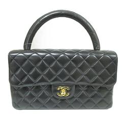 Vintage CHANEL black lambskin classic 2.55 handbag purse with golden cc closure.