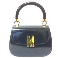 Vintage MOSCHINO black patent enamel Kelly style handbag with M logo and heart 