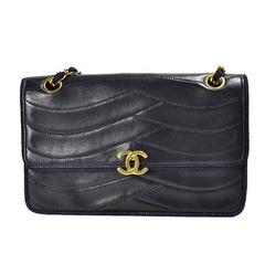 Retro Chanel navy 2.55 bag in fish scale stitch with matching rope and chains.