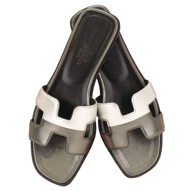 Hermes Sandals Oran Metallic Nappa Leather 37, 5 Canon de Fusil 2016 at  1stDibs | silver hermes sandals, hermes metallic sandals, hermes oran  metallic