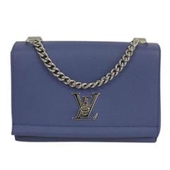 Louis Vuitton - Sac à bandoulière en jean bleu à motif croix Lockme I B