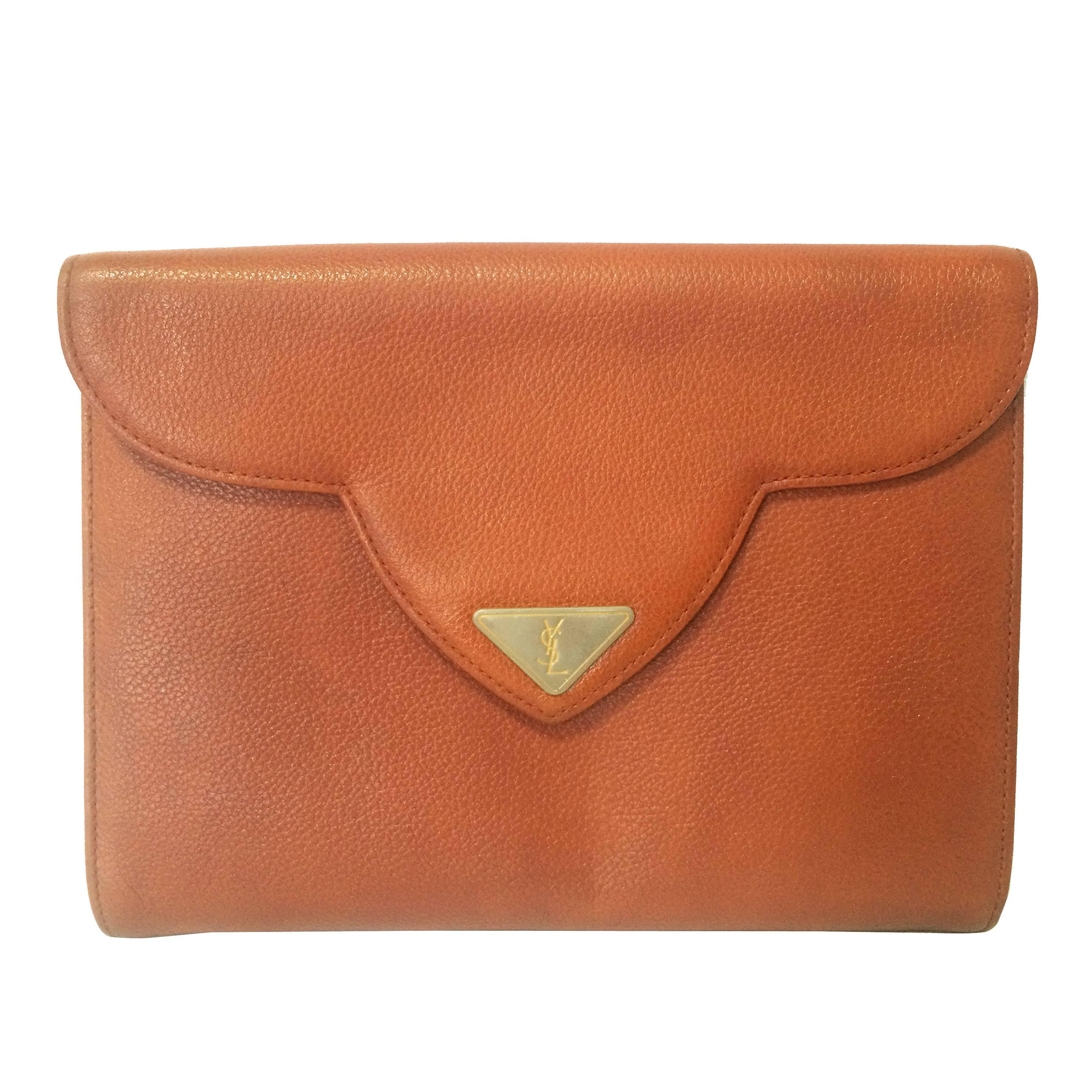 Vintage Yves Saint Laurent genuine brown leather clutch purse with beak tip flap