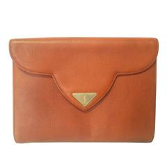 Retro Yves Saint Laurent genuine brown leather clutch purse with beak tip flap