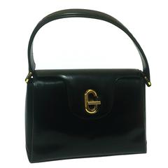 Vintage Gucci black leather classic design handbag purse with G hardware closure