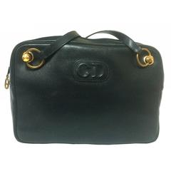 Vintage Christian Dior navy leather shoulder bag with CD motif. MODELE EXCLUSIF