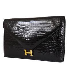 Pochette vintage Lydie en crocodile noir Porosus Lisse Hermès