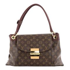 Louis Vuitton Olympe Monogram Canvas