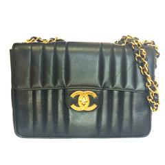 Vintage CHANEL black 2.55 jumbo caviar large shoulder bag, vertical stitches.