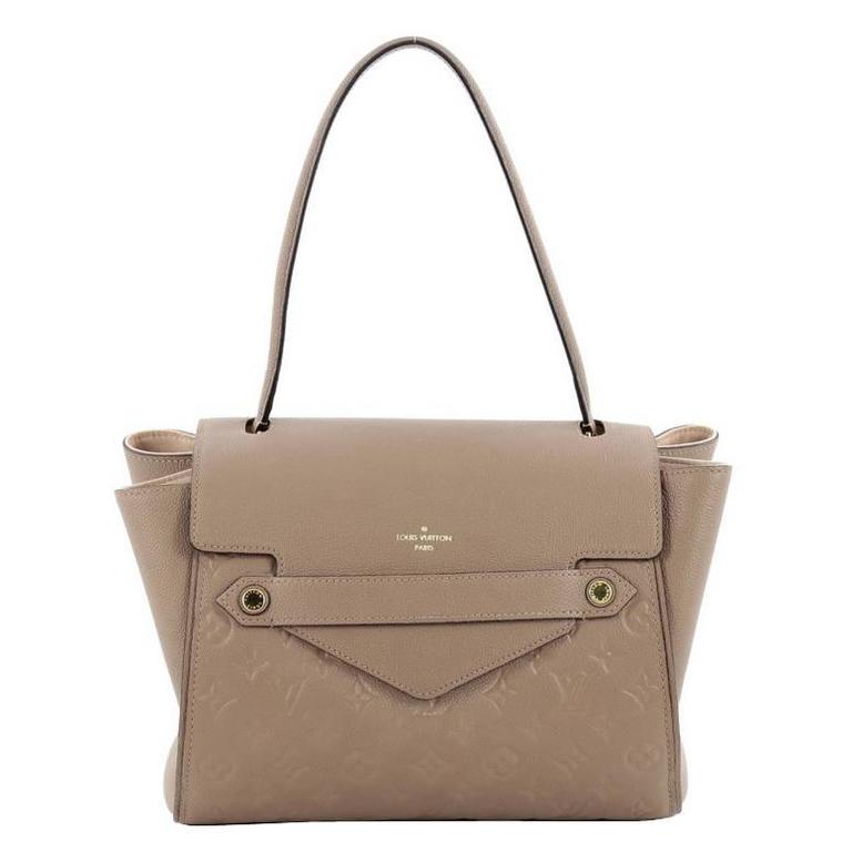 Louis Vuitton Trocadero Beige Empreinte Leather Handbag