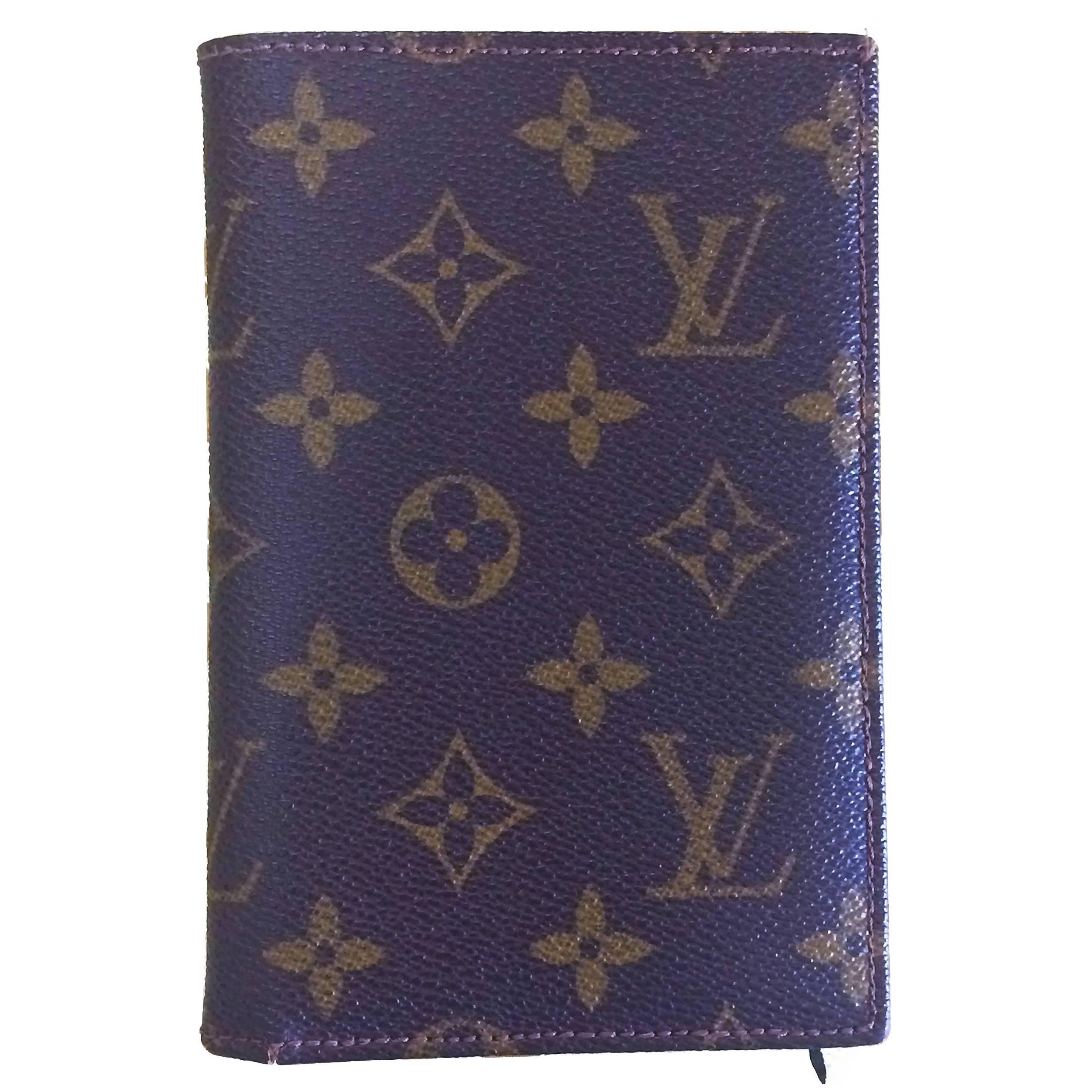 80's vintage Louis Vuitton brown monogram and leather wallet. Classic and unisex