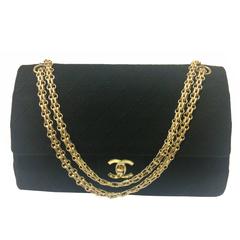 Vintage Chanel classic black jersey 2.55 bag with double flap and skinny chains