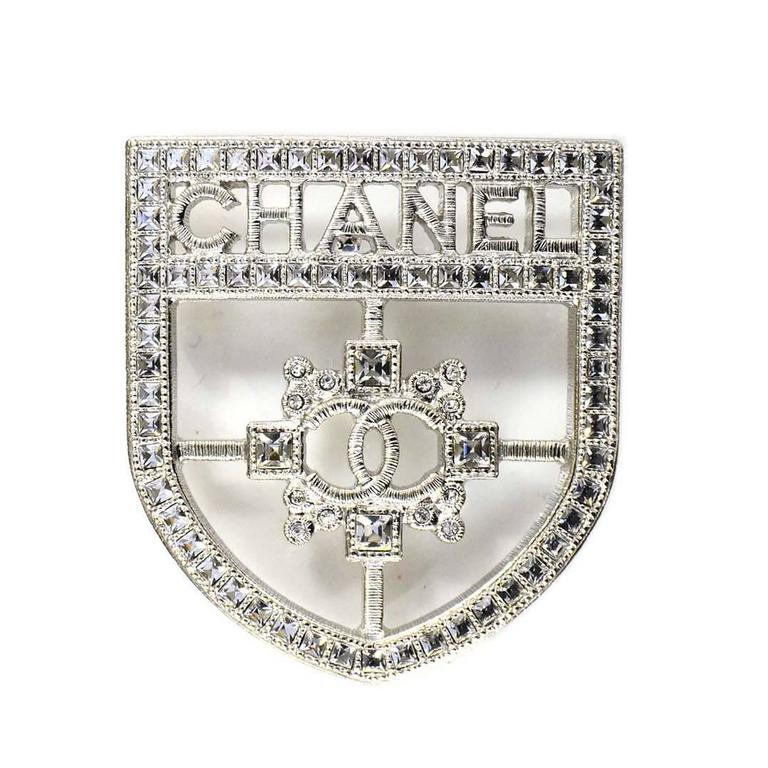 Chanel 2016 Silvertone Crystal CHANEL Shield Brooch For Sale at 1stDibs