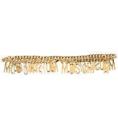 Moschino NEW Gold 'MOSCHINO' Logo Letter Charm Chain Waist Belt