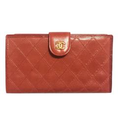 Vintage CHANEL lipstick red calfskin leather wallet with gold tone CC motif. 