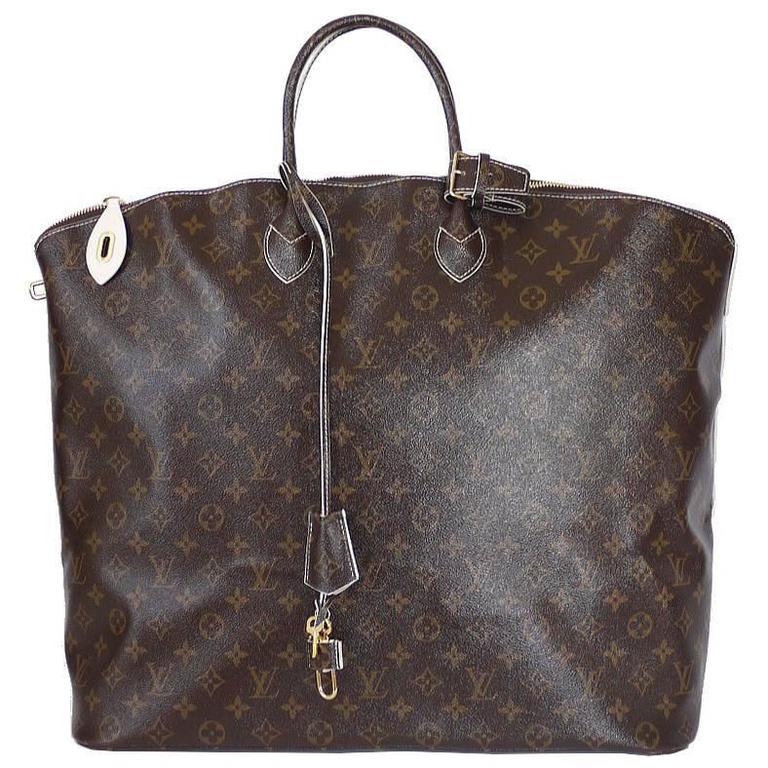 Louis Vuitton Shiny Monogram Fetish Lockit Voyage Travel Bag For Sale at  1stDibs