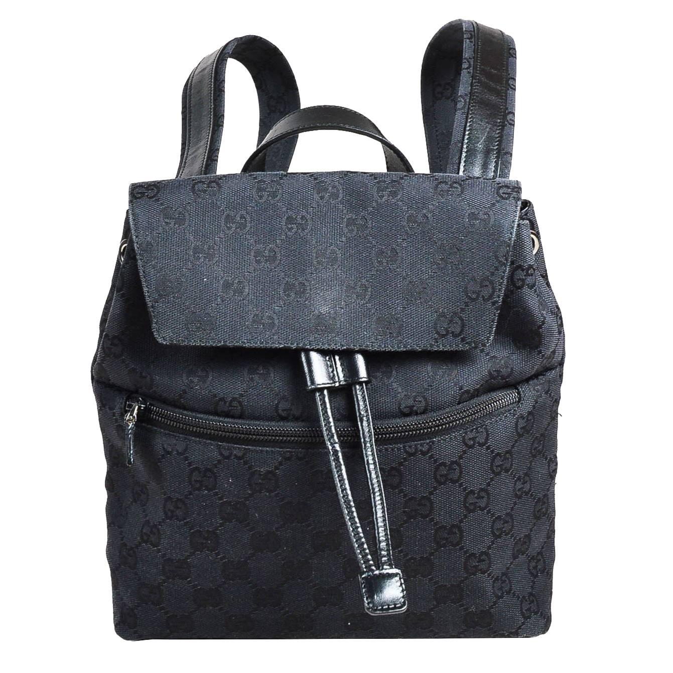Vintage Gucci Black Canvas & Leather 'GG' Monogram Drawstring Mini Backpack For Sale