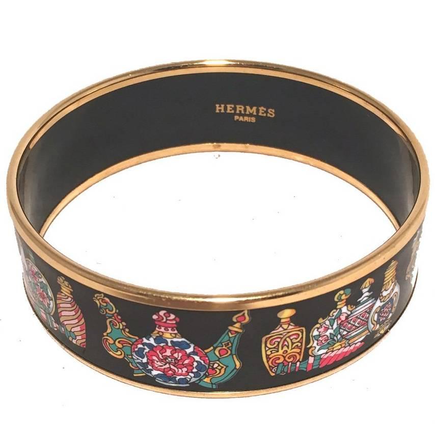 Hermes Gold Perfume Bottle Print Medium Enamel Bangle Bracelet For Sale at 1stdibs