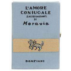 Olympia Le-Tan Blauer Stoff L'Amore Coniugale Buchclutch, um 2015