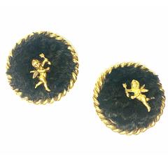 Vintage Karl Lagerfeld large round earrings with dark brown sheep fur and angel.
