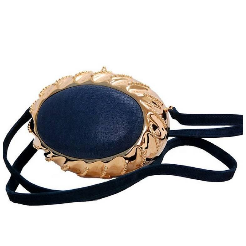 Vintage Hermes rare oval shape black leather and golden brass frame clutch bag. For Sale