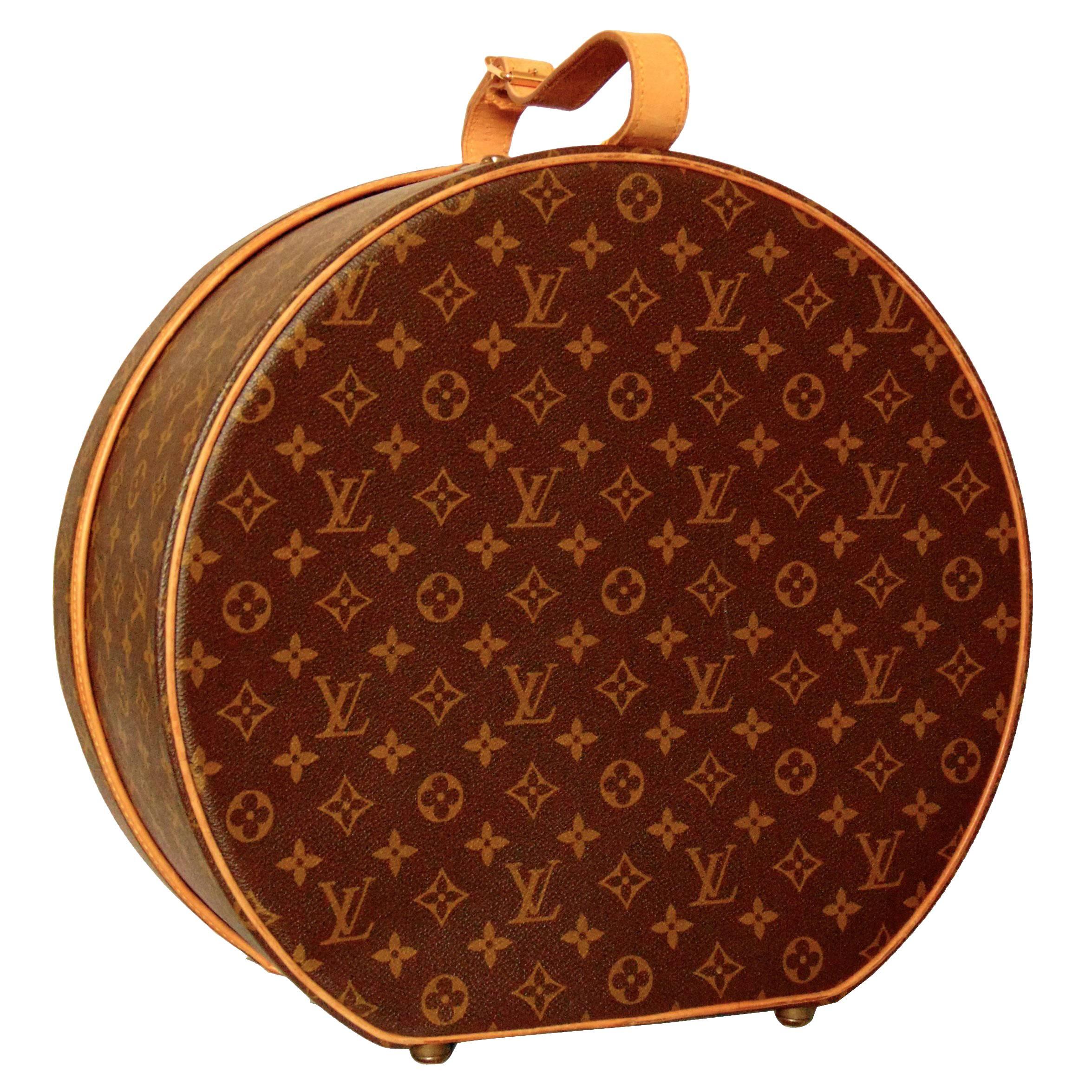 Travel in style with this classic hat box from Louis Vuitton.  Crafted in 1981, this piece features their signature monogram canvas and is trimmed in natural vachetta leather.  The interior is lined in canvas and features one large elasticized