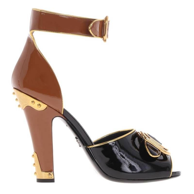 Prada NEW & SOLD OUT Black Cognac Gold Metal Patent Buckle Heels in Box