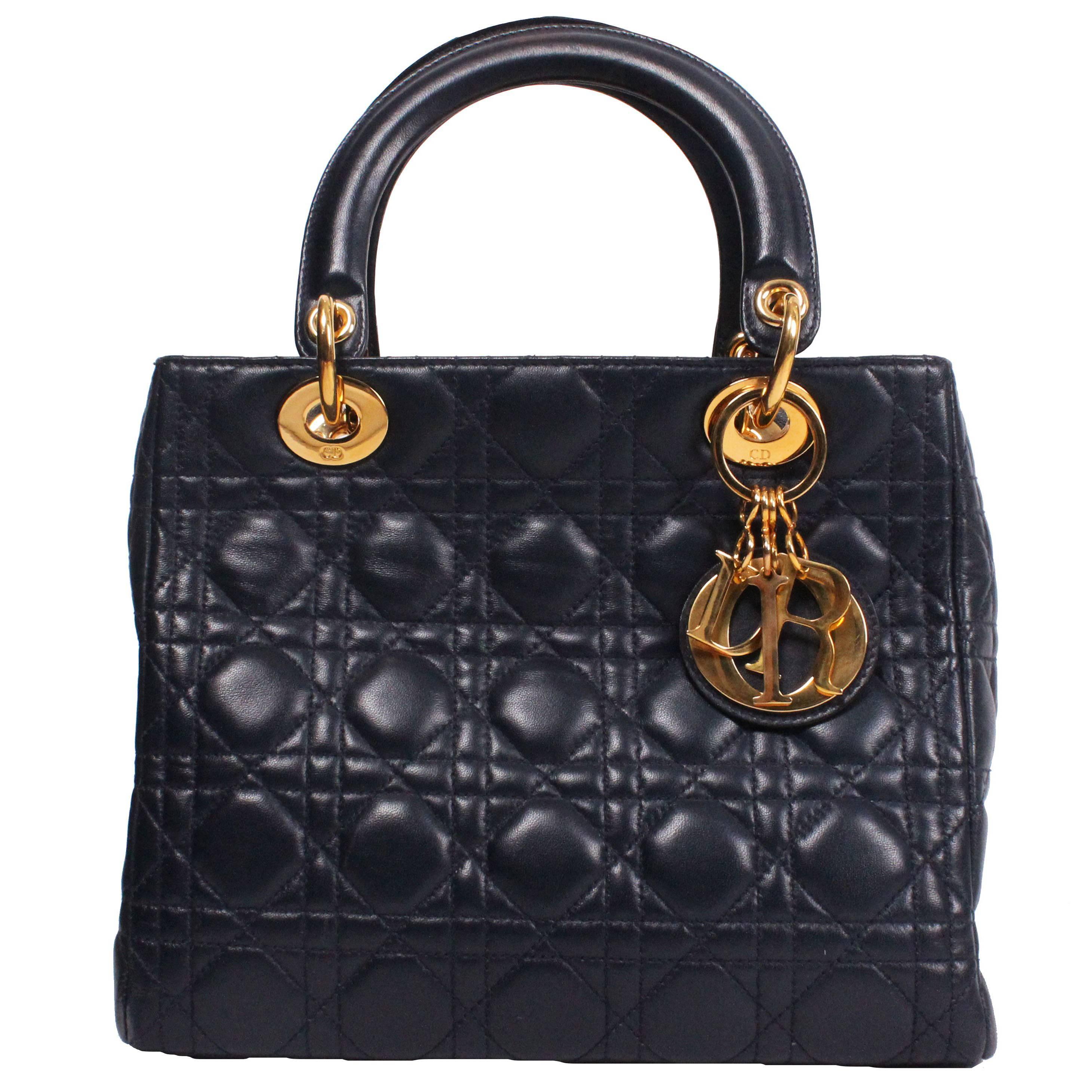 Christian Dior D bag in Navy leather.