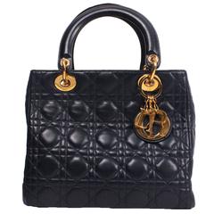 Vintage Christian Dior D bag in Navy leather.