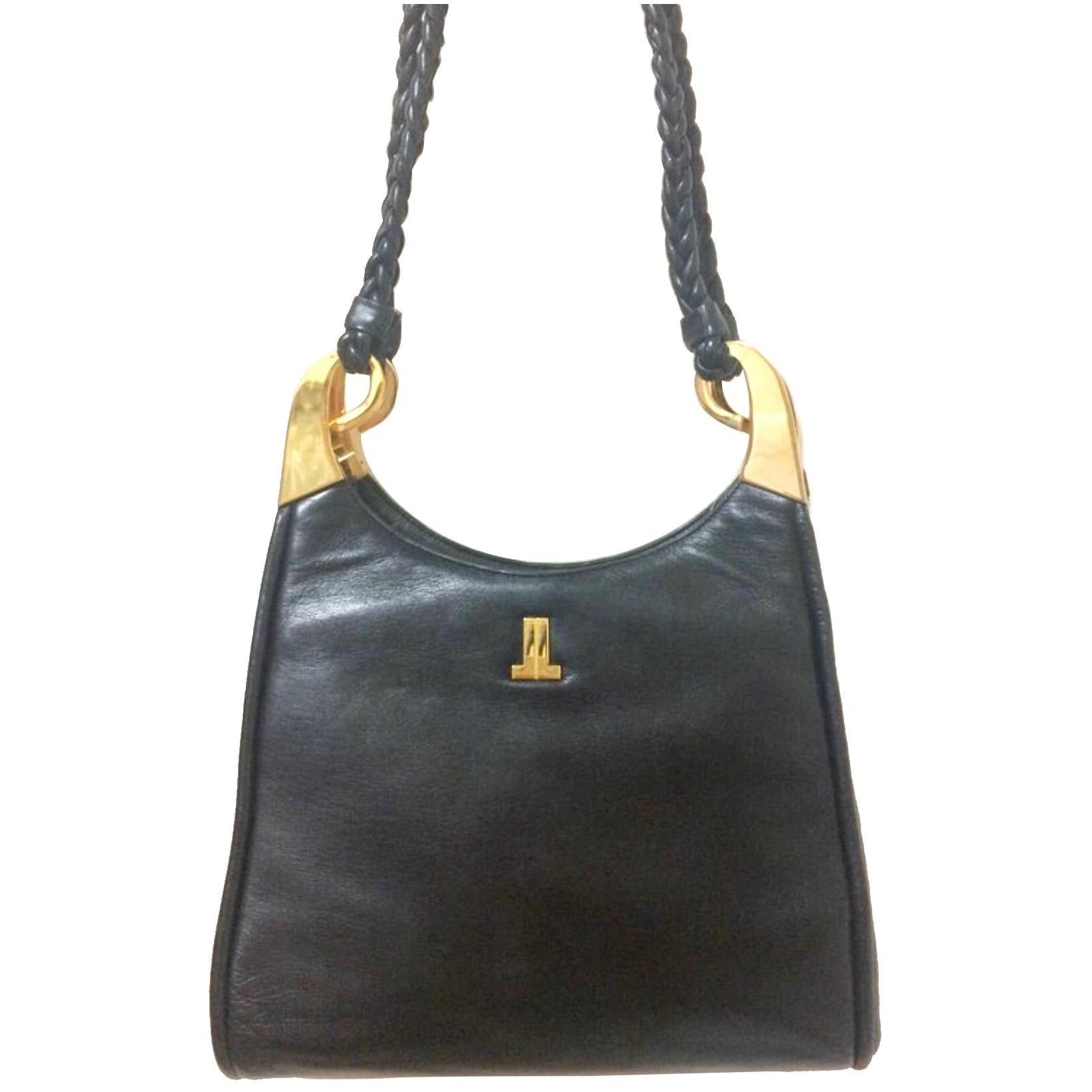 Vintage LANVIN black leather trapezoid shape shoulder bag with kiss lock closure For Sale