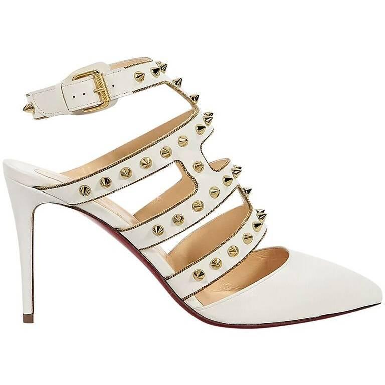 cream louboutin trainers