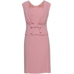1960s Pink Cocktail Dress with black plumage on a stole 