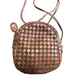 Used Valentino Garavani brown intrecciato mini pouch style shoulder bag.