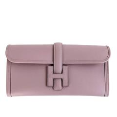 Pochette Hermès en cuir Jige Swift Elan lilas 29 cm très belle