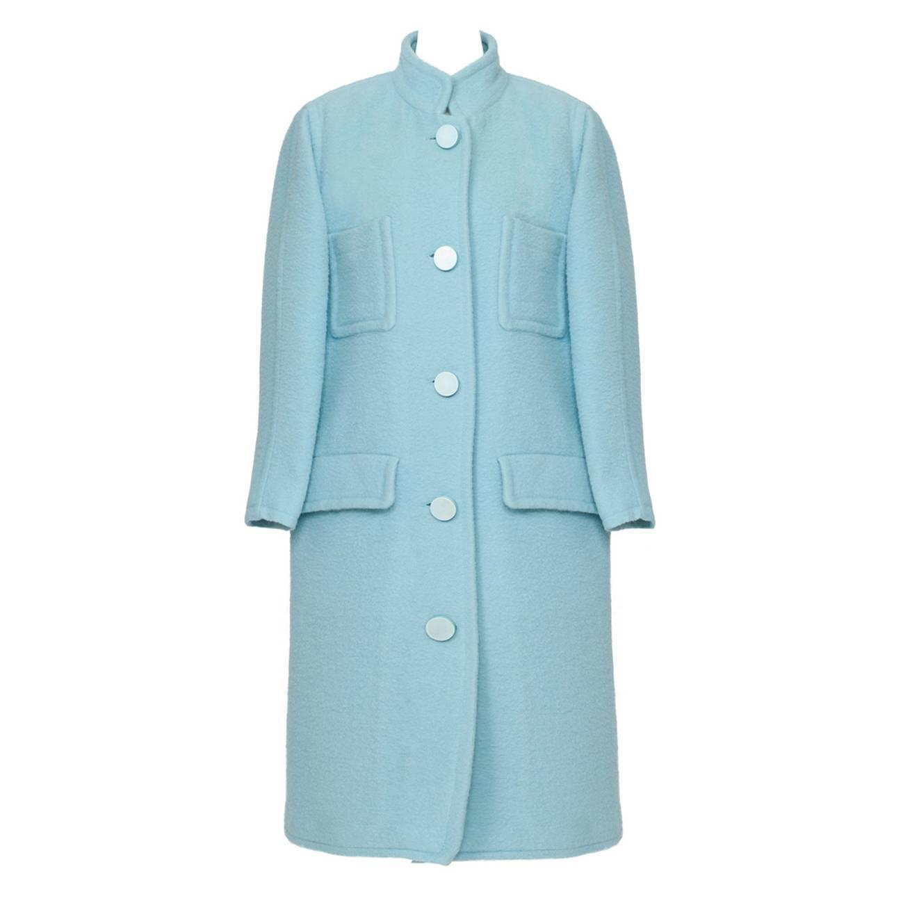 Baby blue wool coat For Sale on 1stdibs - Courreges Baby Blue Wool Coat from 's. This iconic coat featuring oversized patch pockets and sewn in pockets with flap with center front button closure.