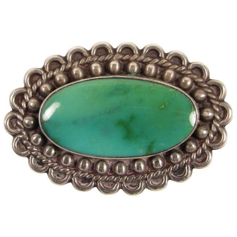 20th Century Navajo Turquoise Sterling Silver Brooch For Sale