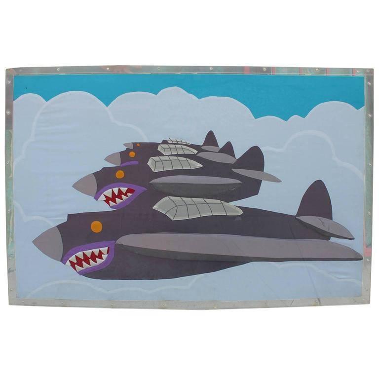 Wonderful abstract tapestry constructed of silk applique from the 1970's. Tapestry has the daring shark/airplane motif of the flying tigers. Excellent and bold colors. Framed in Lucite. 